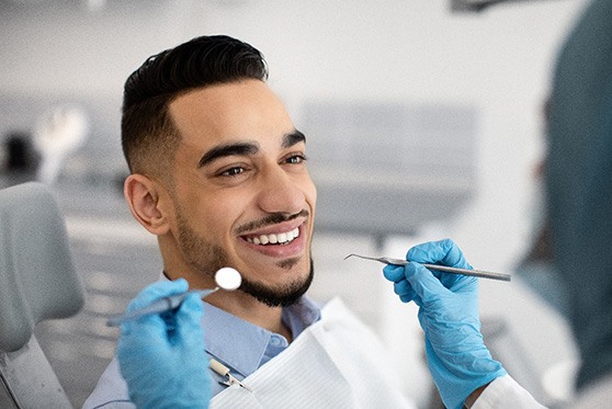 Man smiling during dental checkup