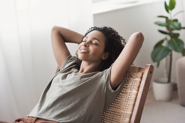 Patient in Bedford relaxing at home after tooth extraction